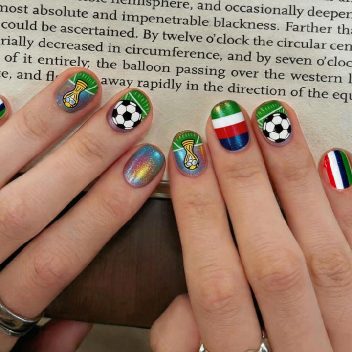 Creative nail art design with football motifs Stornfield