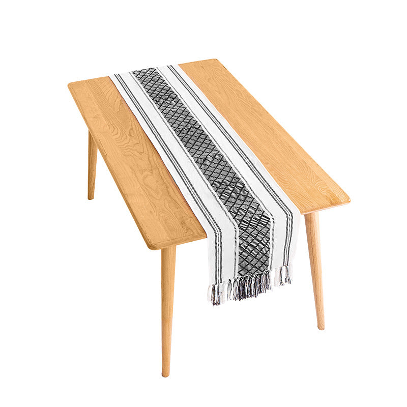 Handwoven cotton table runner with ethnic diamond pattern and fringes Stornfield