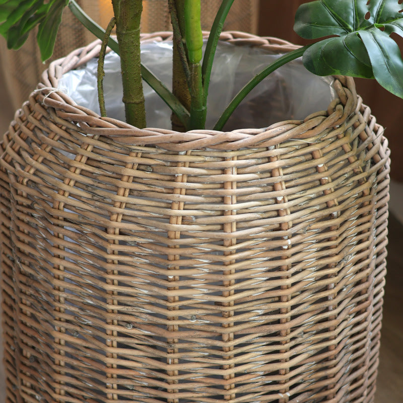 Stylish laundry basket made of braided natural material Stornfield