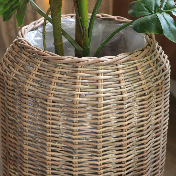 Stylish laundry basket made of braided natural material Stornfield