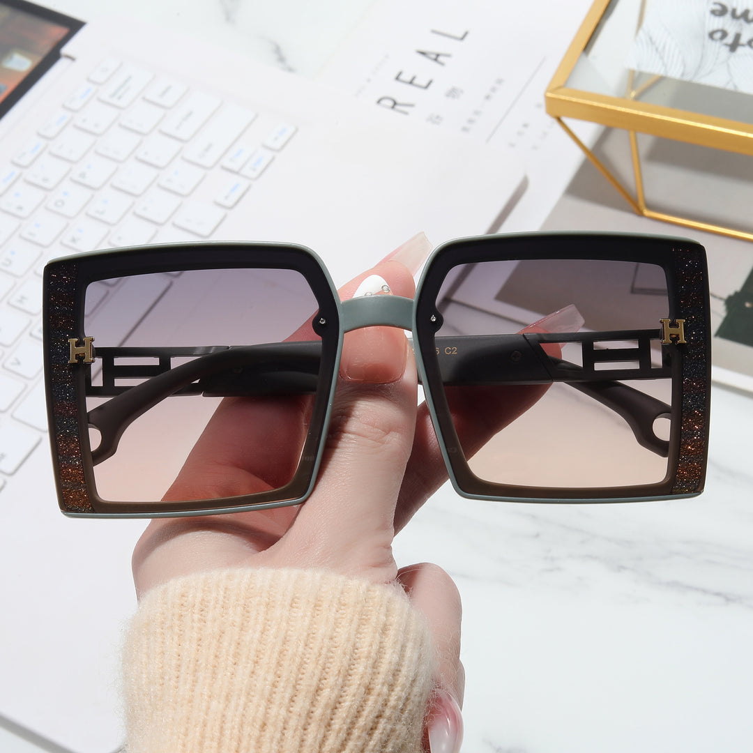 Women’s fashionable sunglasses with extravagant, rectangular frame Stornfield
