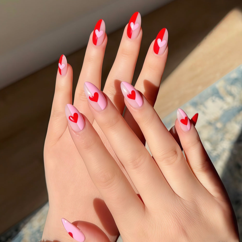 Art nails with romantic heart design Stornfield