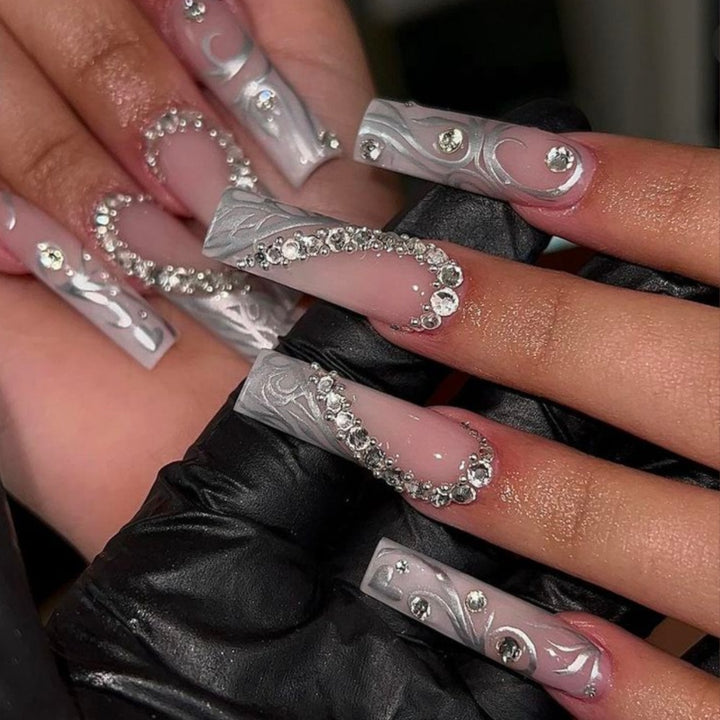 Artificial nails with elegant 3D pattern and radiant rhinestone decorations Stornfield