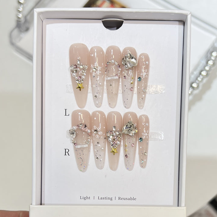 Artistic Press-On Nail Set with Snowflake and Gemstone Designs Stornfield