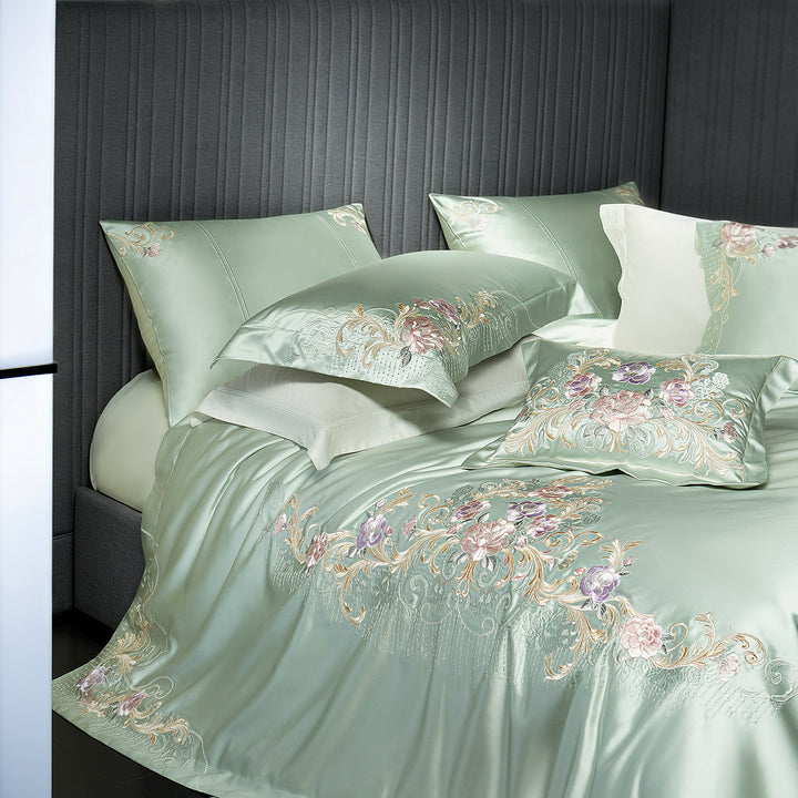 Embroidered satin bedding set with luxury appliqués