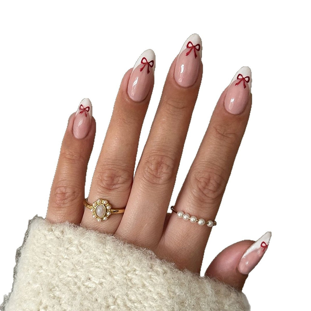 Artificial nail set with playful bow design Stornfield
