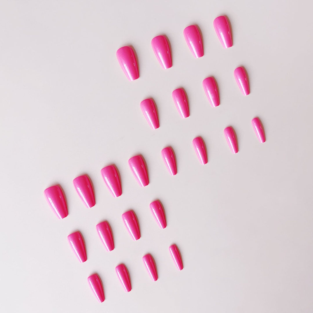 Artificial nail set with glossy finish and stylish elongated tips Stornfield