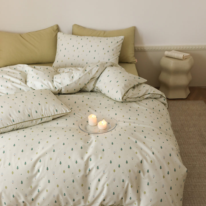 Cotton satin bed linen set with small tree print and contrast piping