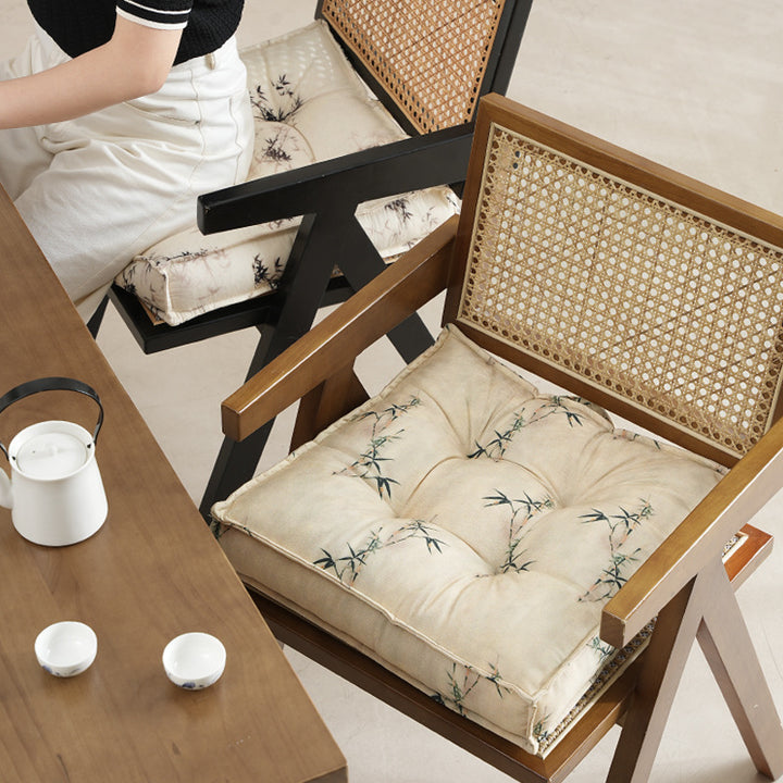 Padded square seat cushion with tufted stitching and fine bamboo print Stornfield