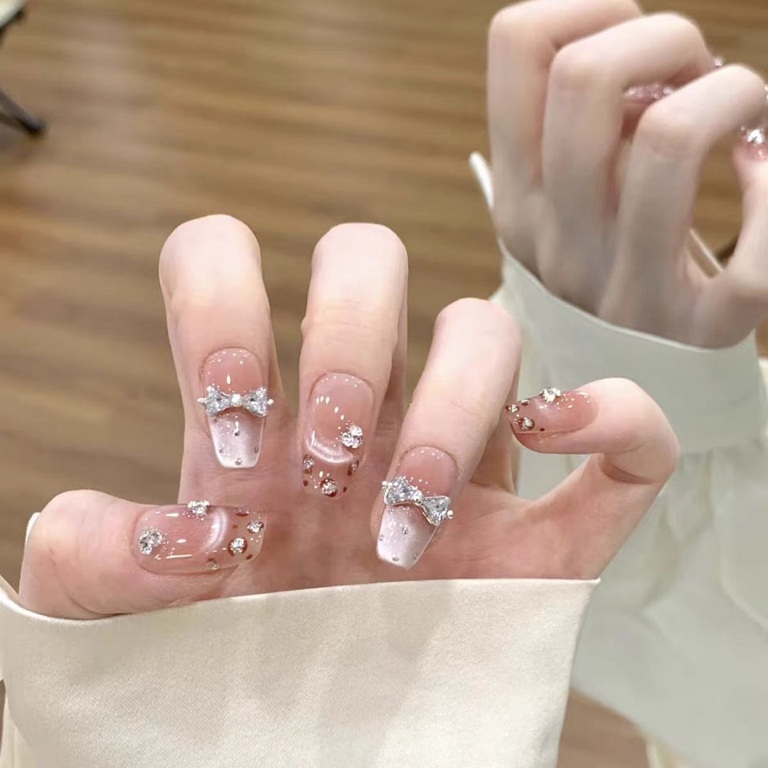 Artificial nails with glamorous rhinestone decorations Stornfield