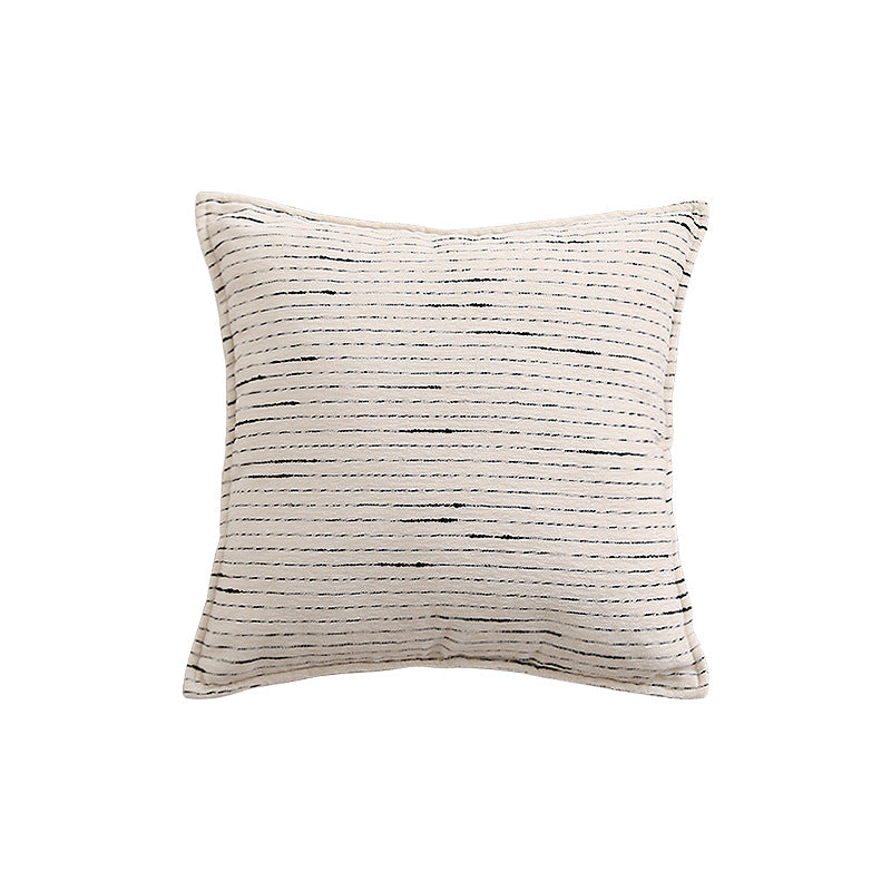 Rectangular quilted decorative cushion with fine line embroidery and natural linen texture