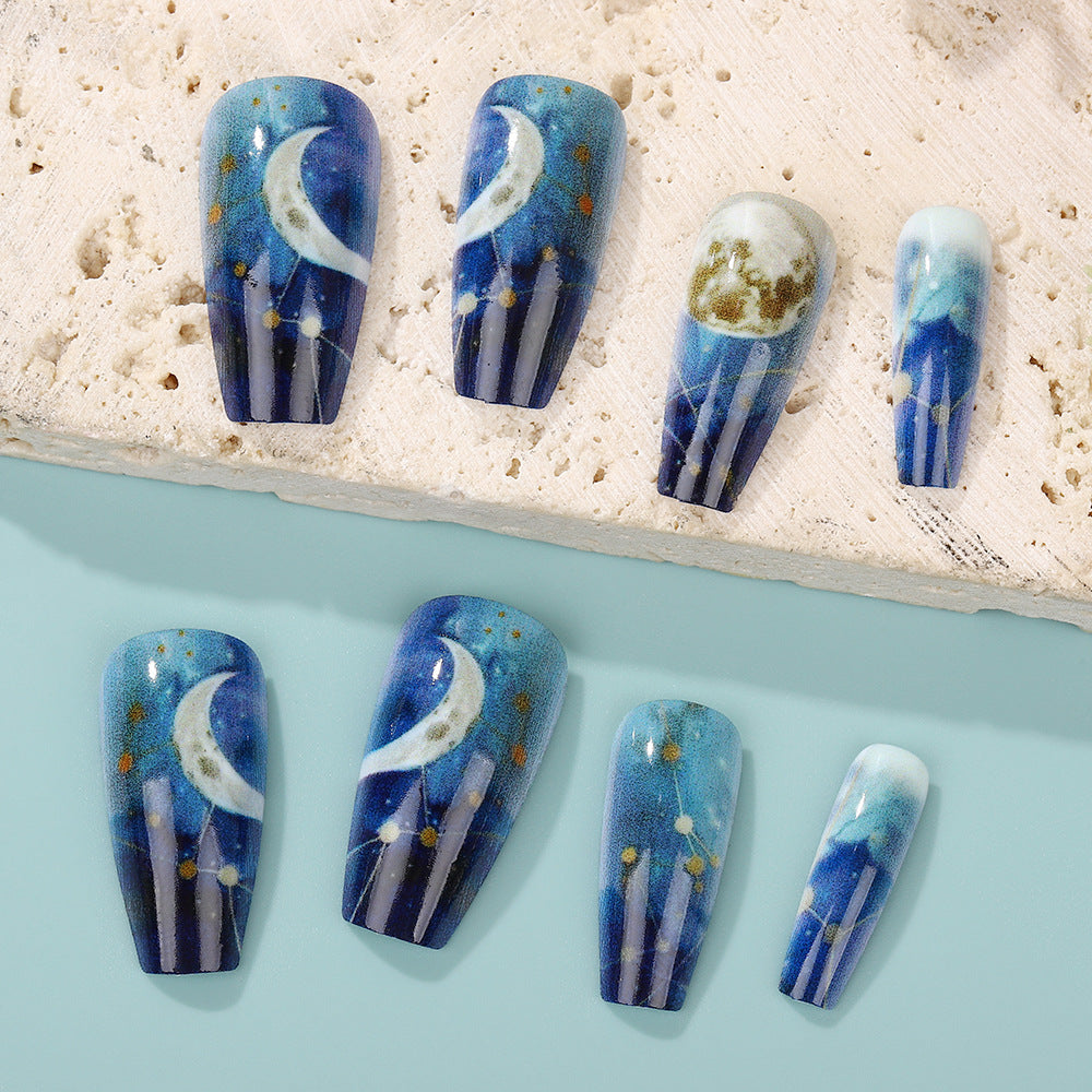 Dreamy artificial nails with moon and star design Stornfield