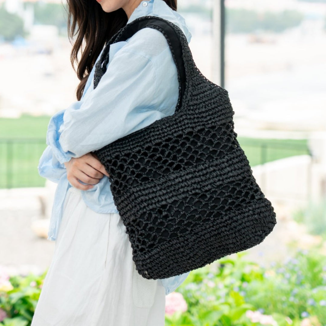Handwoven beach bag with open mesh structure Stornfield