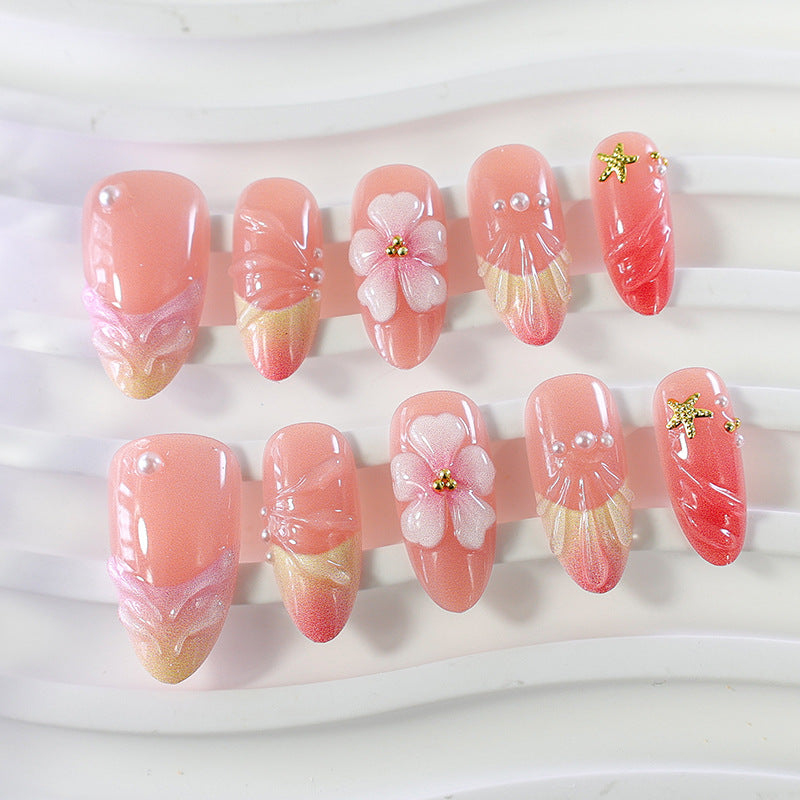 Artificial nail set with elegant floral decorations and luxurious shine Stornfield