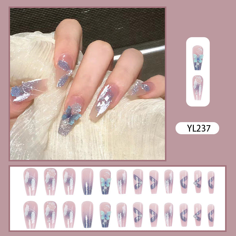 Artistic 3D nail extensions with glitter accents Stornfield