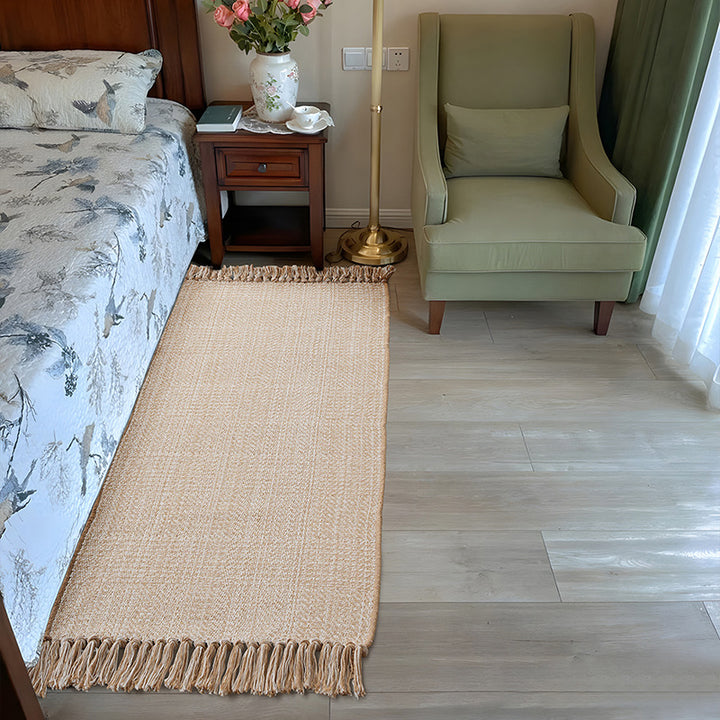 Woven table runner with dense herringbone jacquard and fringes Stornfield