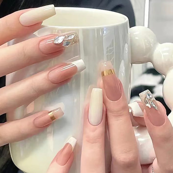 Elegant Long Press-On Nails with Rhinestone and Gold Accents Stornfield