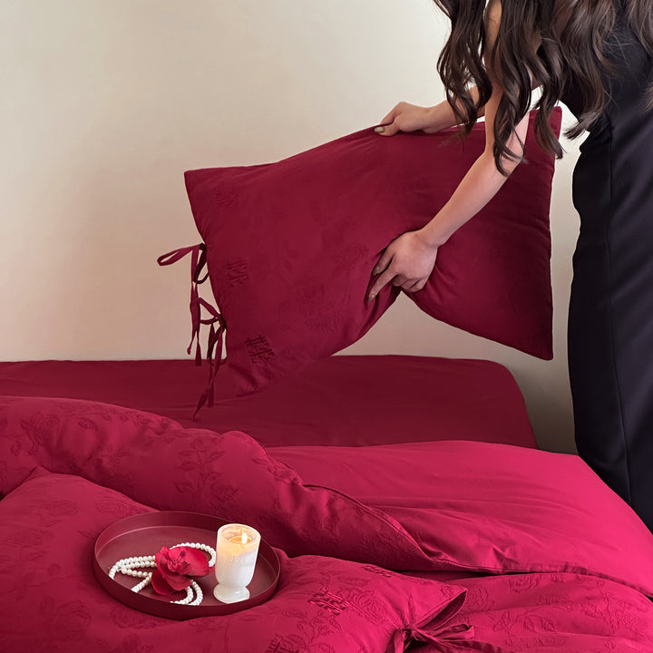 Luxurious cotton satin bedding set with decorative ribbons and jacquard texture