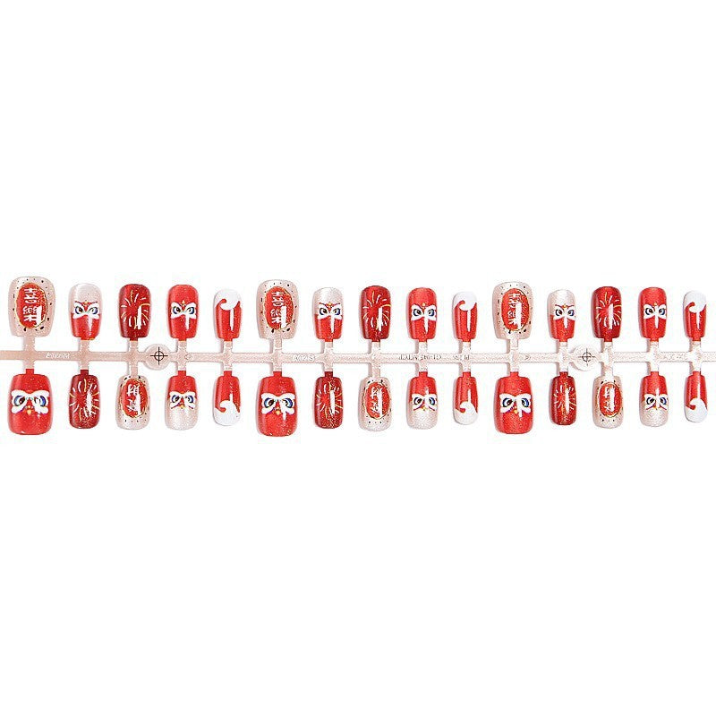 Fake nail set with unique animal motifs and elegant accents Stornfield