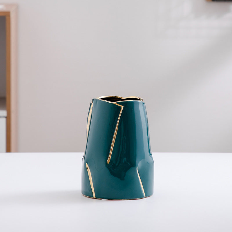 Decorative ceramic vase with golden accents Stornfield