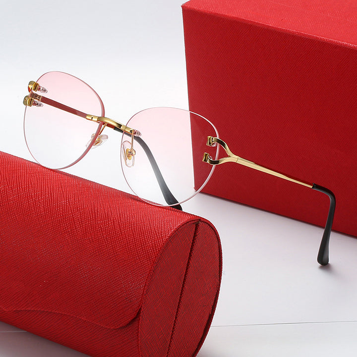 Ladies elegant Cat-Eye sunglasses with gold accents and UV protection Stornfield