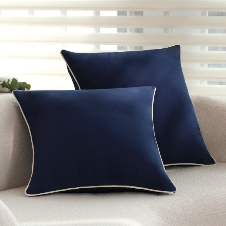Square cushion cover with contrasting piping and microvelours surface Stornfield