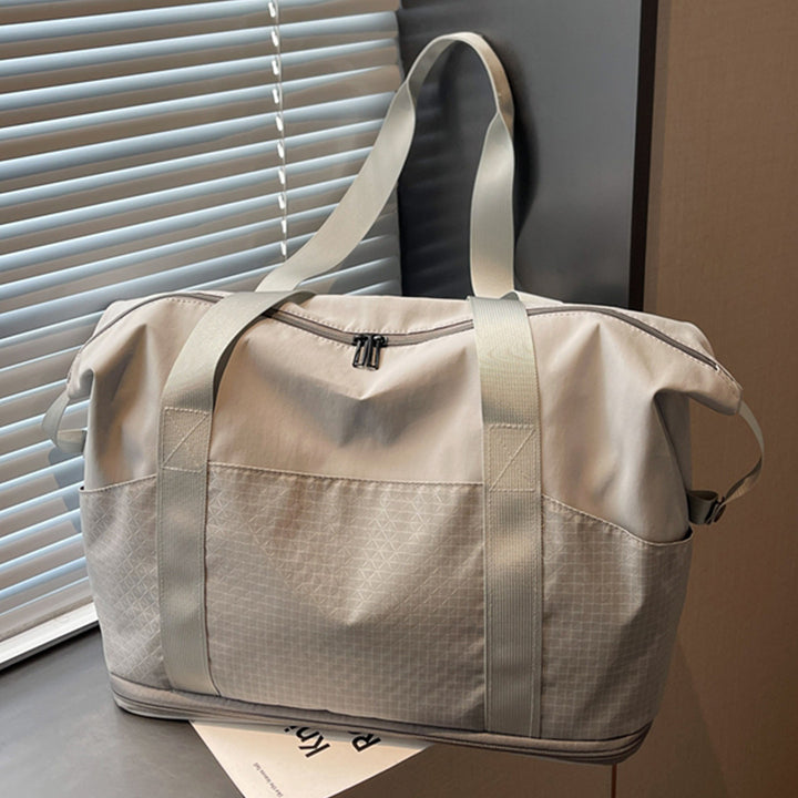 Multifunctional sports and travel bag with innovative compartment arrangement Stornfield