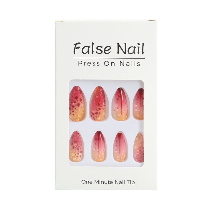 Creative artificial nails with appealing ombre and glitter effects Stornfield
