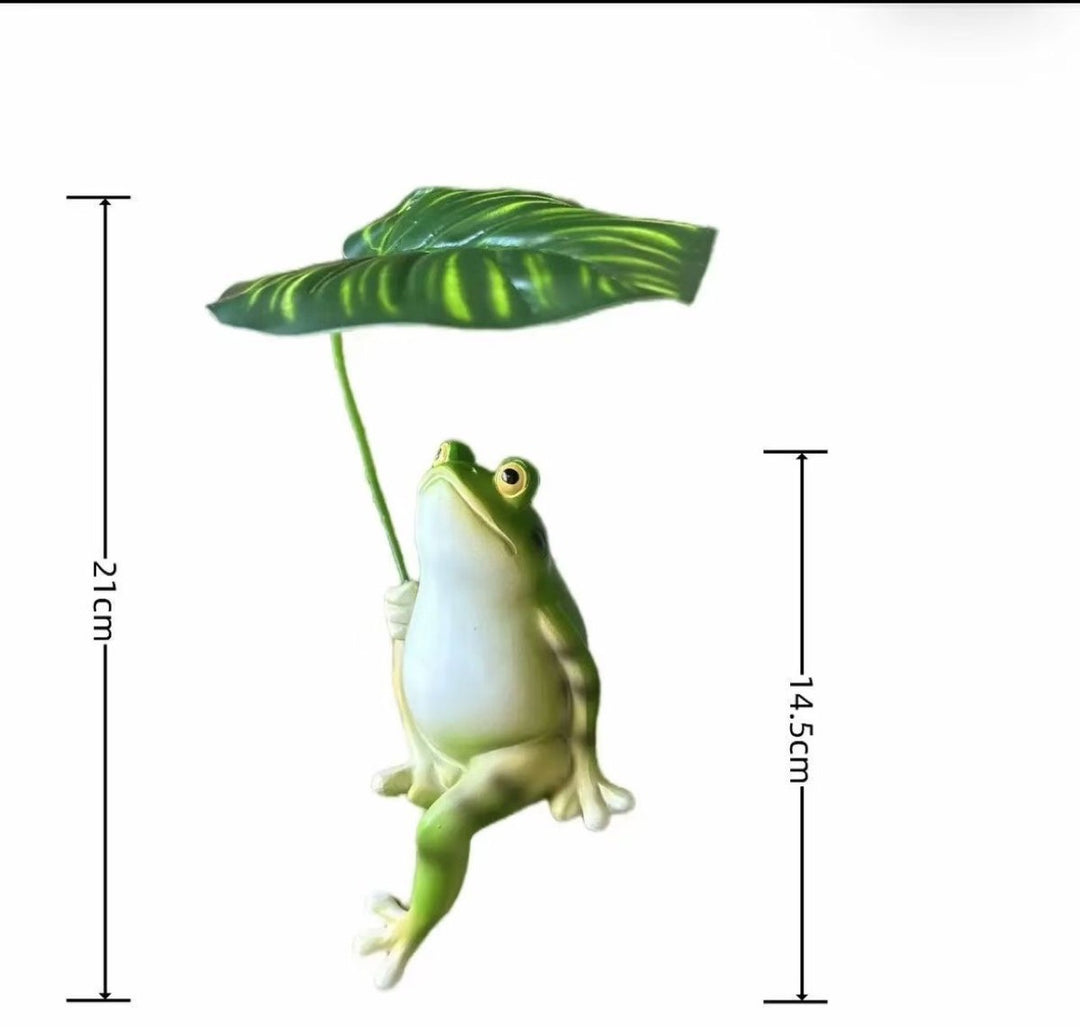 Funny frog figure with umbrella Stornfield