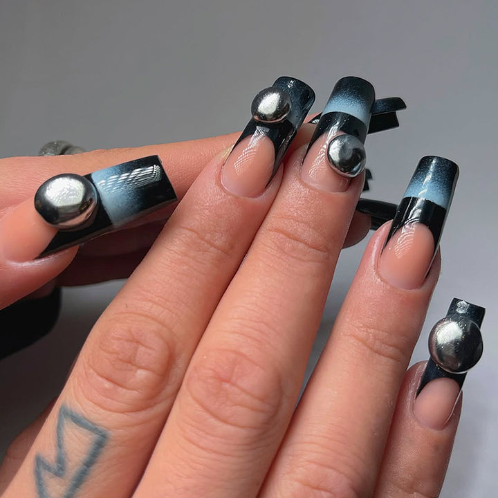 Artificial nails with unique geometric accents Stornfield
