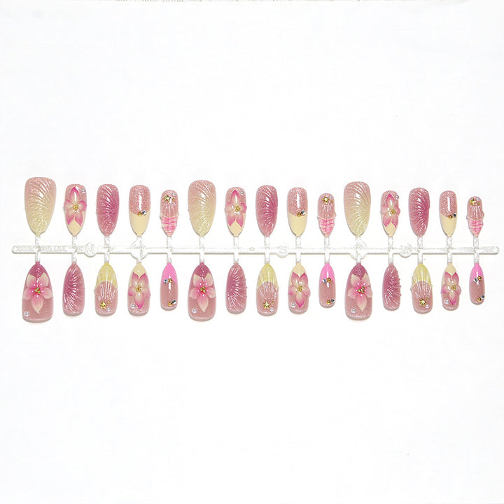 Art nail set with filigree flower decorations and glitter elements Stornfield