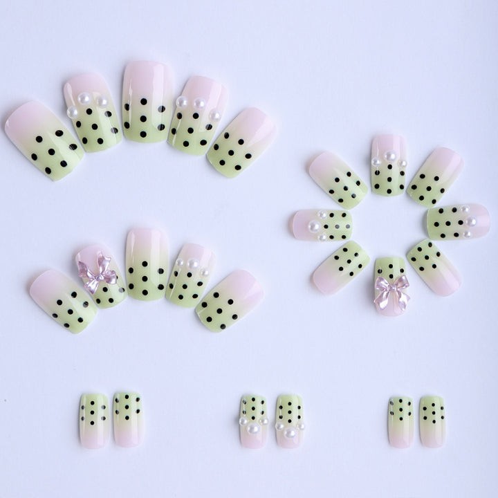 Artificial nails with playful dots and 3D elements Stornfield