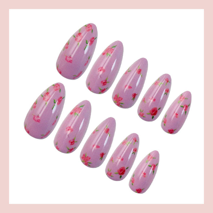 Acrylic nail set with elegant French tip and shimmering accents Stornfield