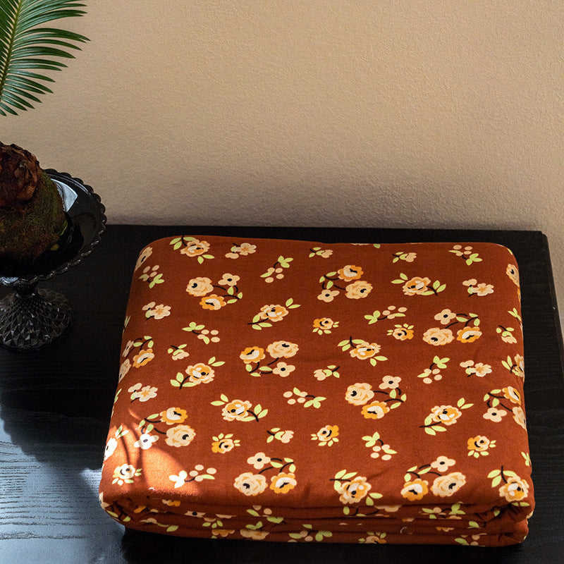 Organic Cotton Muslin Swaddle Blanket with Playful Cartoon Print