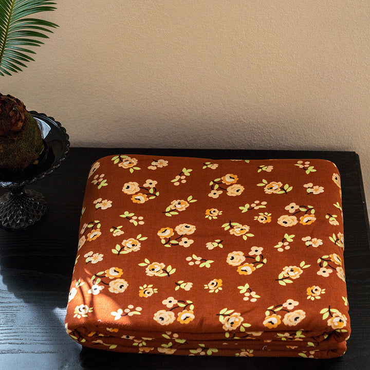 Organic Cotton Muslin Swaddle Blanket with Playful Cartoon Print