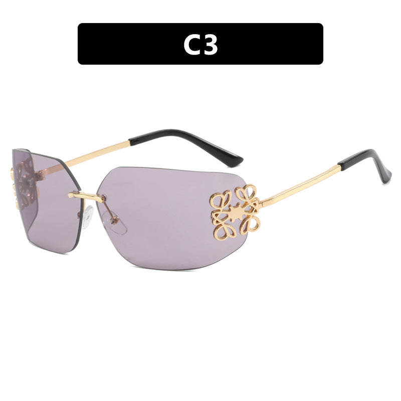 Ladies extravagantly designed sunglasses with elegant embellishments Stornfield