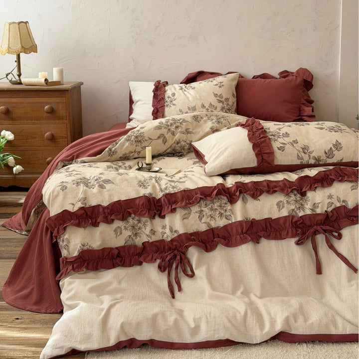 Bedding set made of cotton-linen mix with ruffles, ties and botanical print