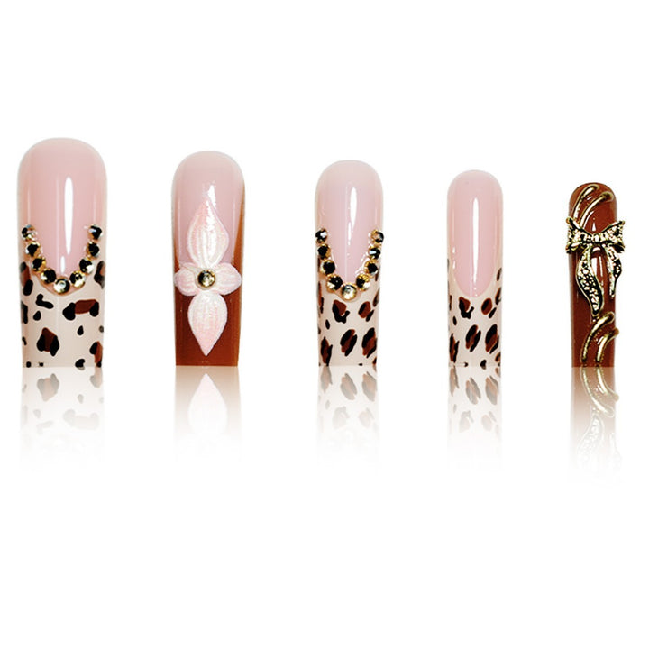 Artistic Long Press-On Nail Extensions with Elegant Floral Design Stornfield