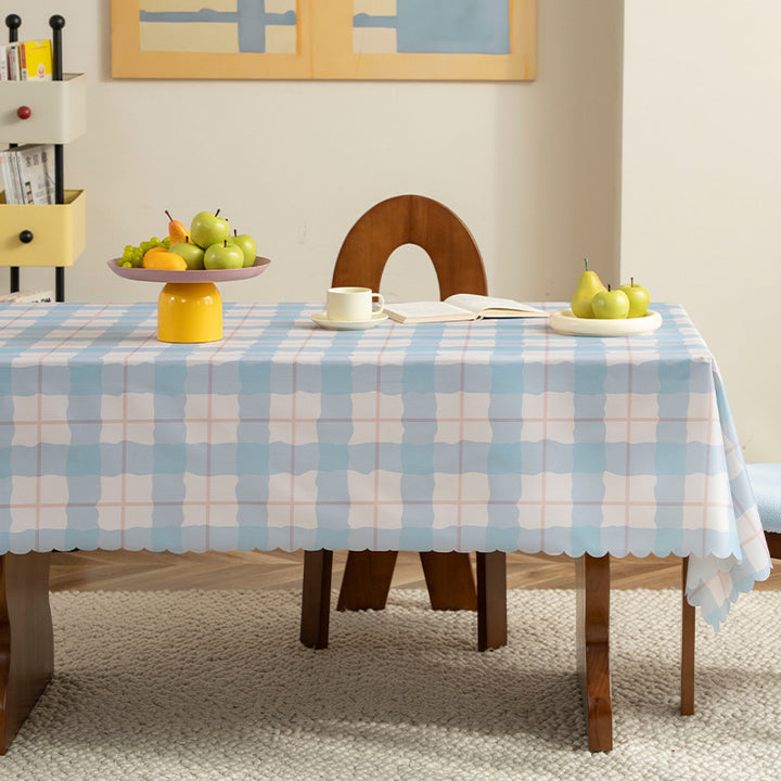 Wipeable tablecloth with star pattern and wavy hem Stornfield