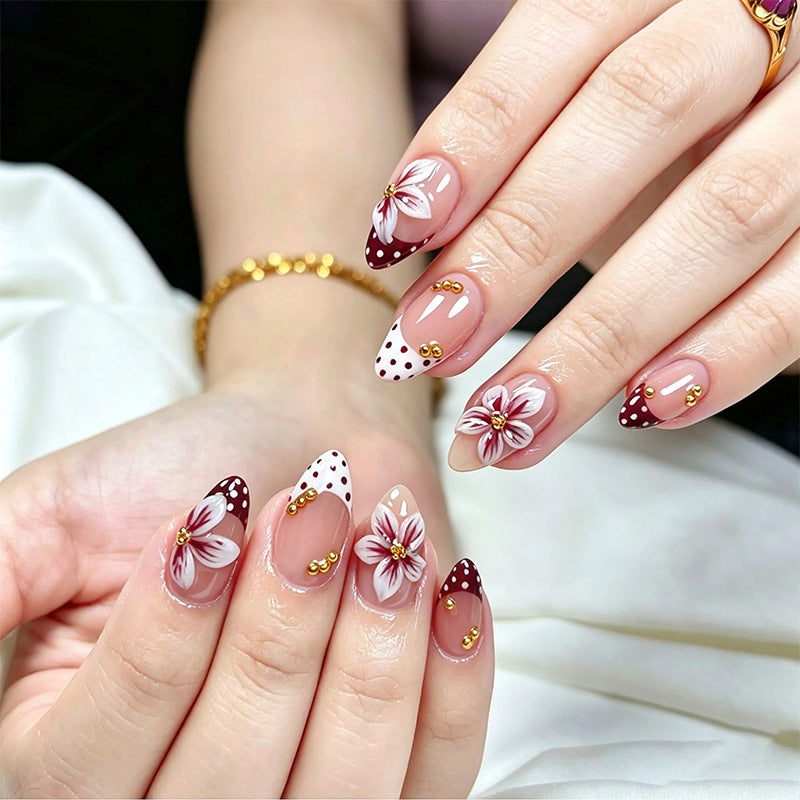 Artistic Nail Tips with Floral Decoration Stornfield