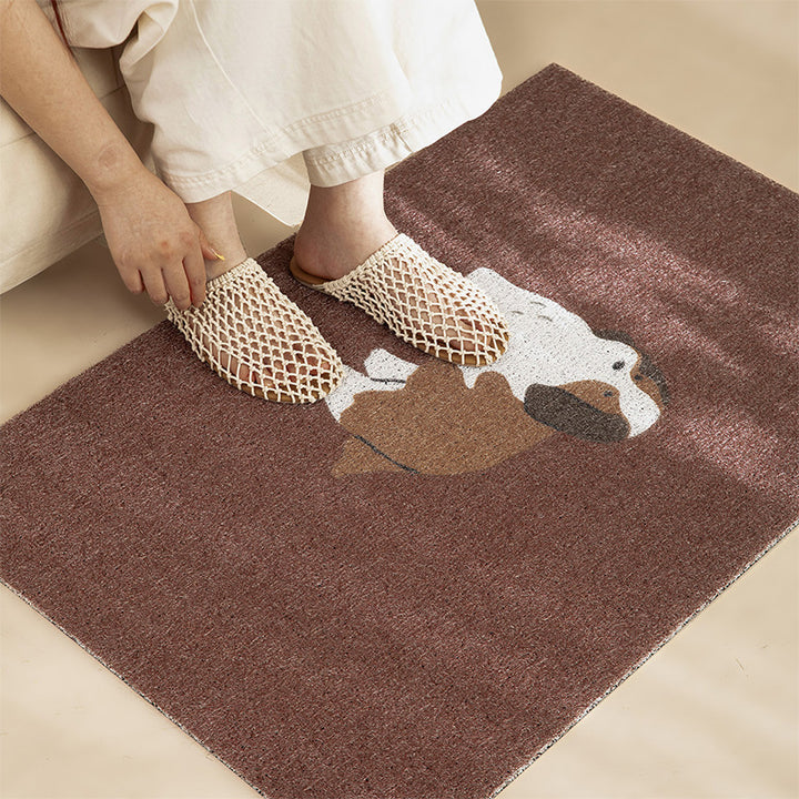 Coconut doormat with vertical striped structure and playful dog motif Stornfield