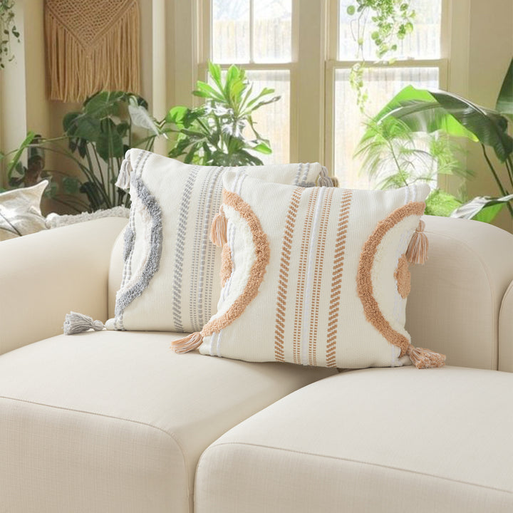 Woven decorative cushion cover with semi-circular tuft appliqué, fringe tassels, and concealed zipper Stornfield
