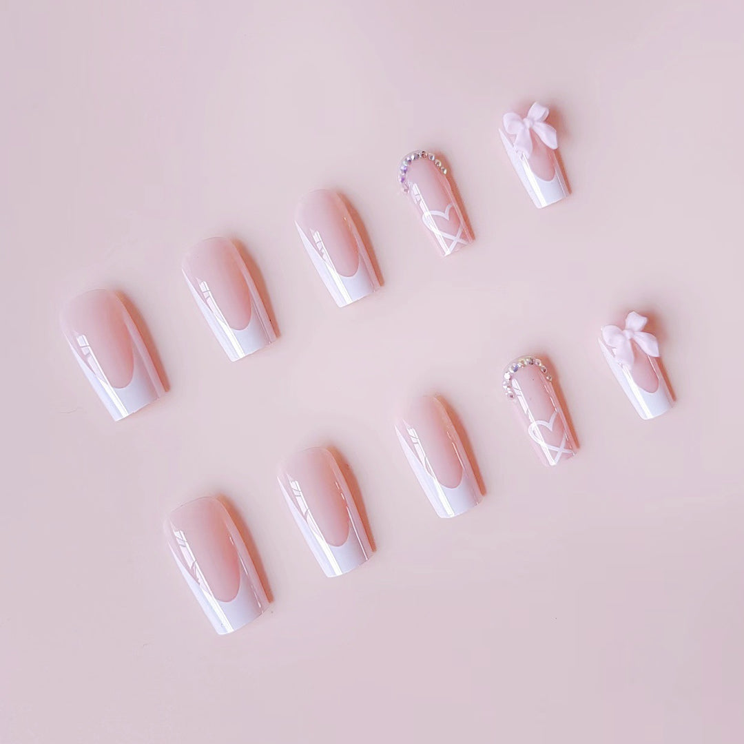 Nail art set with elegant 3D bows and rhinestone embellishments Stornfield