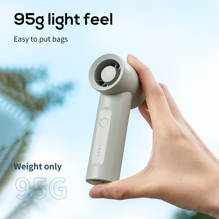 Unisex portable wireless handheld fan with rechargeable battery and quiet motor Stornfield
