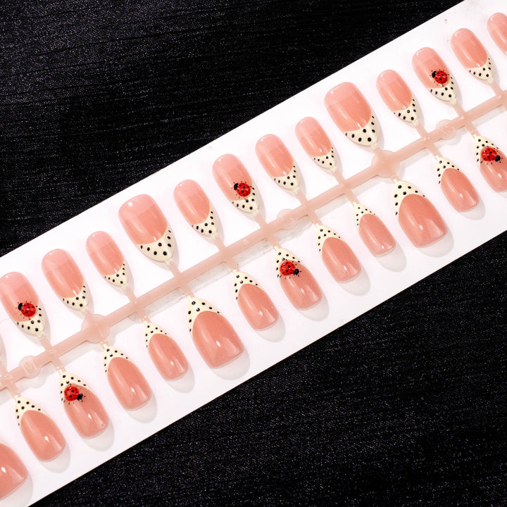 Artistic Press-On Nail Set with Ladybug and Polka Dot Design Stornfield