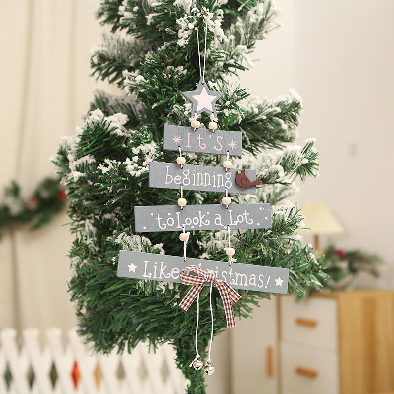 Decorative wooden sign with Christmas greeting Stornfield