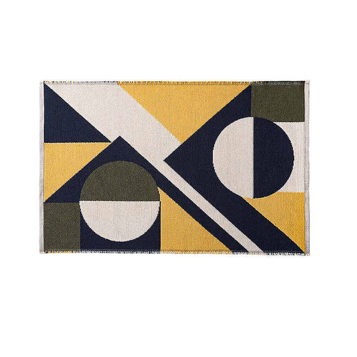 Flat-woven living room rug in a graphic tile pattern
