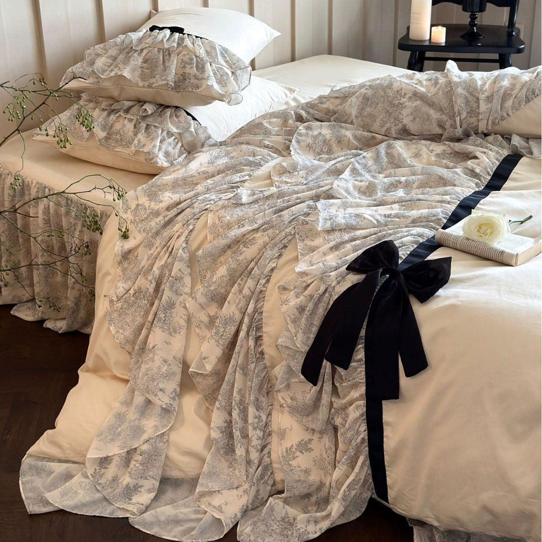 Romantic bedding set with frills, ruffles and bow decoration