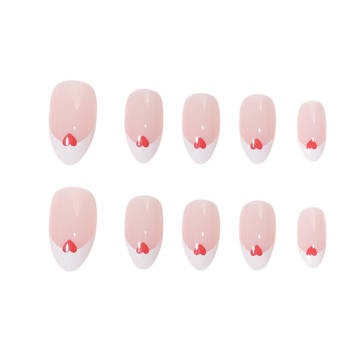 Heart-Adorned French Tip Nail Set Stornfield