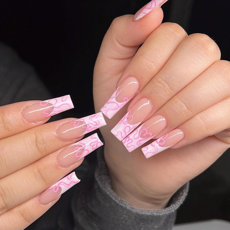 Artistic Long Press-On Nails with Heart Design Stornfield